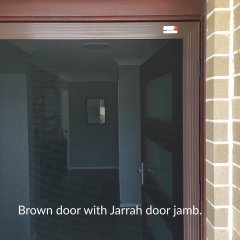 Brown door with Jarrah door jam
