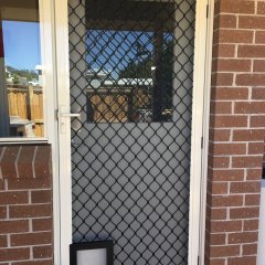 Diamond grille barrier door - black grille insert