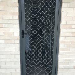 Diamond Grille barrier door